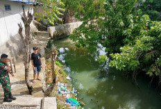 Satgas TMMD Ke-124 Kodim 0408/BS Bersama Warga Pantau Aliran Sungai