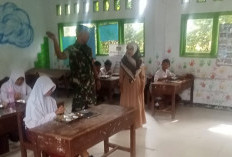 Satgas TMMD  Ke-124 Kodim 0408/BS Komsos di Sekolah