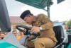 Musrenbangcam Air Nipis 2026, Pemkab BS Serahkan Hand  Traktor Roda 4 untuk Petani